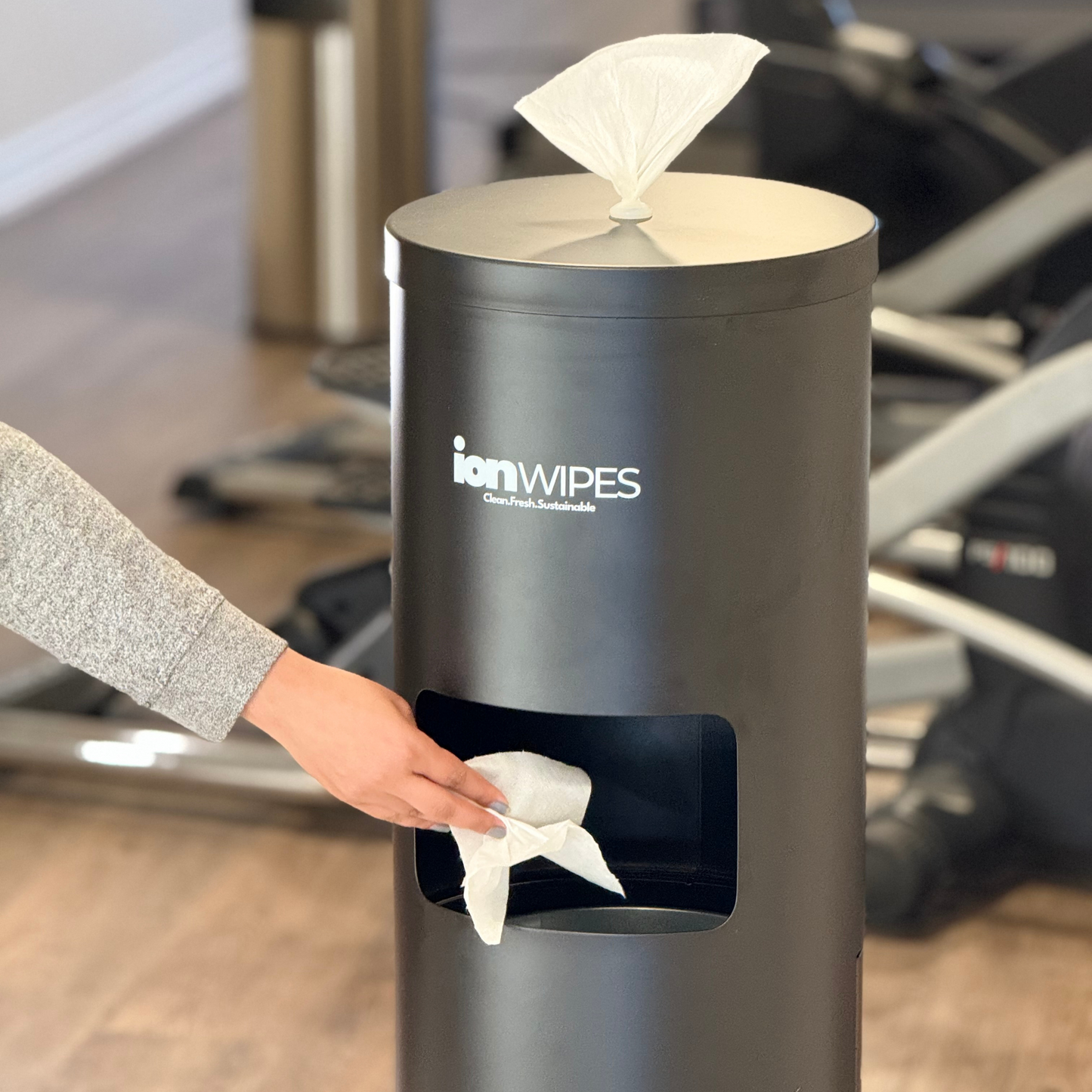 Gym Wipes with a floor-standing dispenser